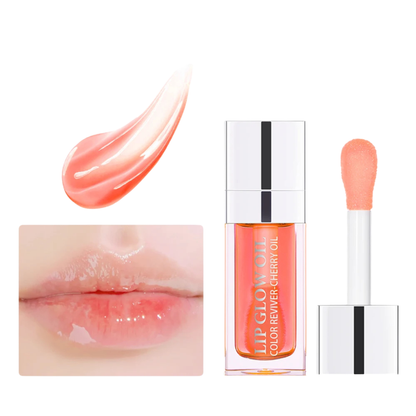 Applicateur brosse large déposant une gelée de cristal teintée à la cerise sur les lèvres
