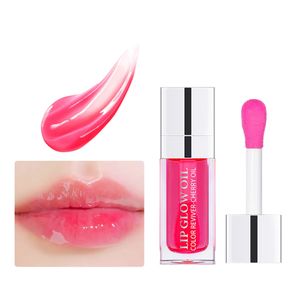 Applicateur brosse large déposant une gelée de cristal teintée à la cerise sur les lèvres