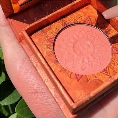 Palette duo maquillage avec poudre cuite bronzer et blush rosé, texture marbrée lumineuse.
