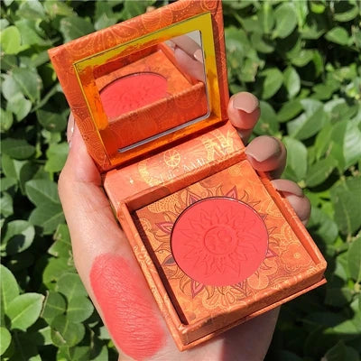 Palette duo maquillage avec poudre cuite bronzer et blush rosé, texture marbrée lumineuse.