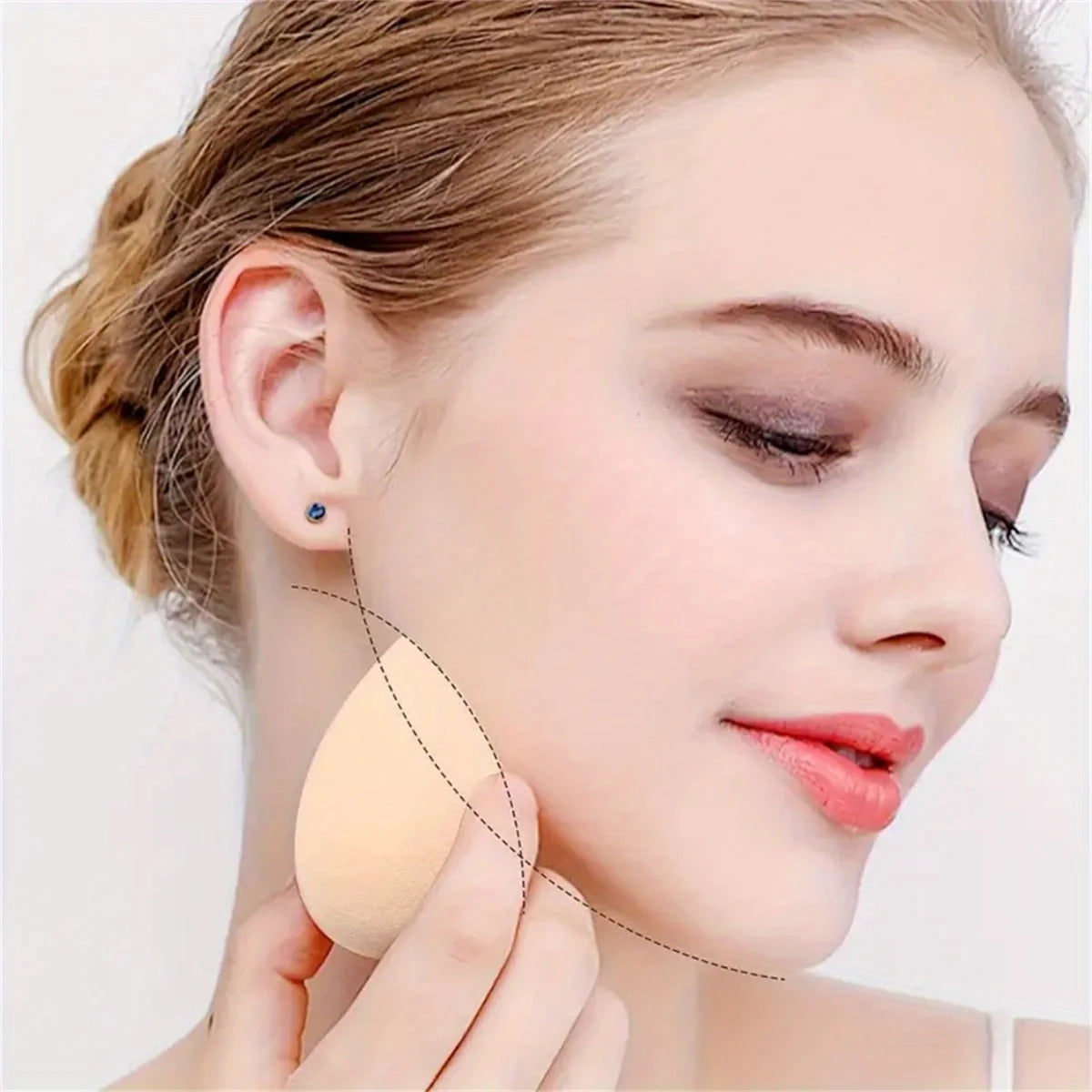 Lot d'éponges de maquillage en forme de goutte, couleurs en dégradé ombre, texture douce sans latex.
