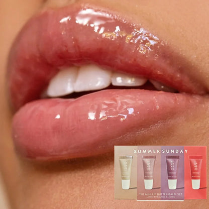 Coffret de 4 gloss à lèvres teintés aux nuances estivales, texture onctueuse et brillante.