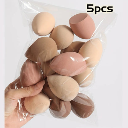 Lot d'éponges de maquillage en forme de goutte, couleurs en dégradé ombre, texture douce sans latex.

