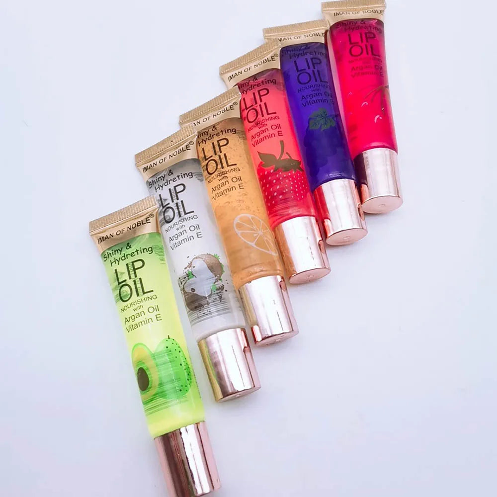 Collection de 6 gloss transparents fruités dans un packaging élégant et urbain