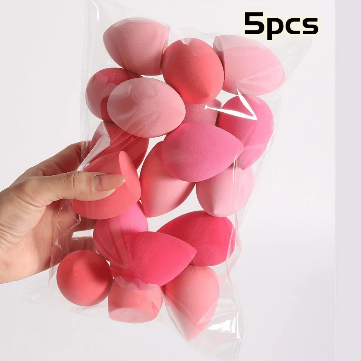 Lot d'éponges de maquillage en forme de goutte, couleurs en dégradé ombre, texture douce sans latex.
